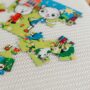Puzzle pour enfant posé sur un lit - fidgets et puzzles
